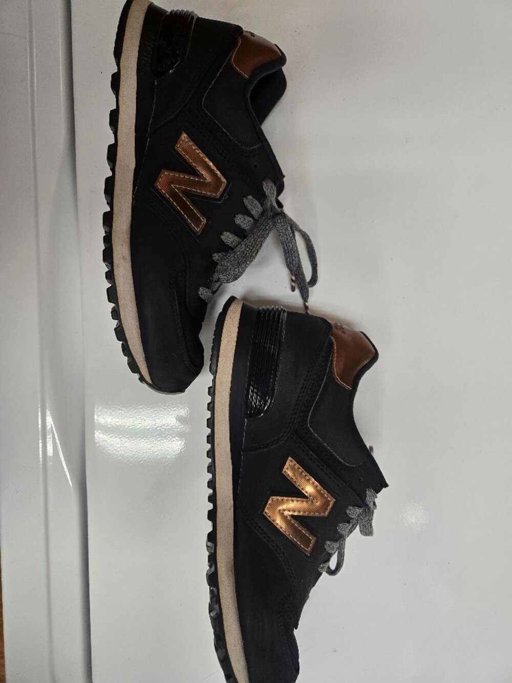 New Balance 574 women's 7 black and gold